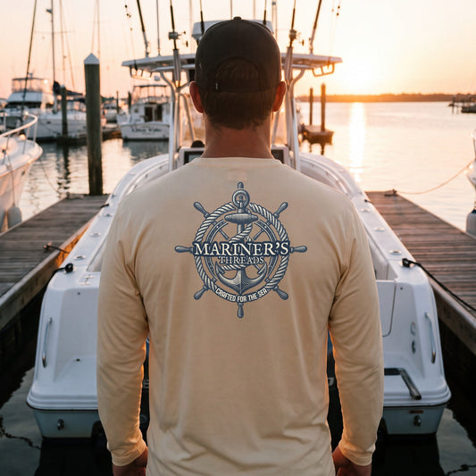 Helm & Anchor performance shirt in cream on the dock at sunset after a day offshore